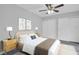 Stylishly furnished bedroom with modern furniture and neutral decor for a peaceful retreat at 714 1St Ct, Palm Harbor, FL 34684