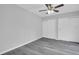 Bedroom featuring neutral paint and flooring and a ceiling fan with integrated lighting at 714 1St Ct, Palm Harbor, FL 34684