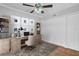 Office space with built-in desk, shelves, and ample storage; perfect for remote work at 714 1St Ct, Palm Harbor, FL 34684