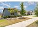 Inviting single-story home with lush landscaping and a well-maintained lawn at 7305 Tiger Trail Ct, Sun City Center, FL 33573