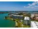 Waterfront condo building featuring a stunning view of the bay and surrounding cityscape at 7872 Sailboat Key S Blvd # 301, South Pasadena, FL 33707