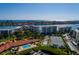 An aerial view showcases the tennis courts, shuffleboard, pool and marina at 7872 Sailboat Key S Blvd # 301, South Pasadena, FL 33707