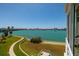 Wide balcony features water views and landscaped lawns at 7872 Sailboat Key S Blvd # 301, South Pasadena, FL 33707