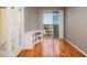 A balcony view of serene waterfront scenery, accessible through glass-paned doors at 7872 Sailboat Key S Blvd # 301, South Pasadena, FL 33707