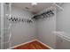 Walk-in closet with installed white wire shelves and wooden floors, providing ample storage at 7872 Sailboat Key S Blvd # 301, South Pasadena, FL 33707