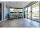 Inviting lobby area with comfortable seating and views of lush landscaping at 7872 Sailboat Key S Blvd # 301, South Pasadena, FL 33707