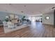 Cozy lounge area with comfortable seating, a piano, and natural light entering from the exterior at 7872 Sailboat Key S Blvd # 301, South Pasadena, FL 33707
