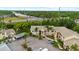Aerial view of community, showing parking, and landscaping at 7910 Hardwick Dr # 717, New Port Richey, FL 34653