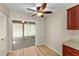 Bright kitchen area featuring sliding glass doors leading to the lanai with natural light at 7910 Hardwick Dr # 717, New Port Richey, FL 34653