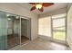 Relaxing outdoor lanai featuring tile flooring, screens, and access to the living area at 7910 Hardwick Dr # 717, New Port Richey, FL 34653