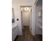 Bathroom showing vanity with storage, linen closet, and separate water closet with toilet at 8114 Oak Trace Way # D, Tampa, FL 33634