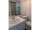 Bathroom with a white vanity, toilet, shower and black tile floors at 8114 Oak Trace Way # D, Tampa, FL 33634