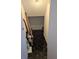 A storage area features black marble style floors and white walls, offering functionality at 8114 Oak Trace Way # D, Tampa, FL 33634