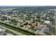 Stunning aerial view showcases the property nestled within a lush, green neighborhood and landscape at 854 77Th N Ave, St Petersburg, FL 33702
