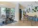 Bonus room featuring tile flooring, an exercise bike, and a view of the back yard at 854 77Th N Ave, St Petersburg, FL 33702