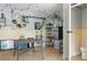 Bonus room with tile flooring and decorated with plants and unique accessories at 854 77Th N Ave, St Petersburg, FL 33702