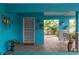 Welcoming front porch with tiled floors, decorative accents, and a view into a bright garden at 854 77Th N Ave, St Petersburg, FL 33702
