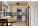 Well-lit kitchen with butcher block countertops, stainless steel appliances, and ample cabinet space at 854 77Th N Ave, St Petersburg, FL 33702