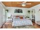 Serene main bedroom features ceiling fan, wood ceiling, and soft color scheme at 854 77Th N Ave, St Petersburg, FL 33702