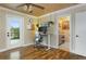 Bright home office with standing desk, wood ceiling, and view of outdoor deck at 854 77Th N Ave, St Petersburg, FL 33702