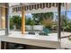 Relaxing pool area with poolside bar, lush landscaping, and comfortable seating at 854 77Th N Ave, St Petersburg, FL 33702