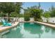 Backyard pool with lush tropical landscaping and serene atmosphere at 854 77Th N Ave, St Petersburg, FL 33702
