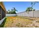 The large backyard is bordered by a privacy fence and is perfect for outdoor enjoyment at 8736 Huntfield St, Tampa, FL 33635