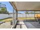 Enjoy the fresh air on this screened patio with a view of the backyard at 8736 Huntfield St, Tampa, FL 33635