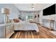 Comfortable bedroom featuring a queen-size bed with view of the pool area at 8740 15Th N St, St Petersburg, FL 33702