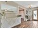 Welcoming foyer with stylish decor and beautiful wood-look flooring at 8740 15Th N St, St Petersburg, FL 33702