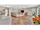 Spacious living room featuring modern decor and wood-look flooring at 8740 15Th N St, St Petersburg, FL 33702