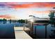 Close-up of boat dock with a lift showcasing the convenience for boat owners at 8848 Sunlit Cove Ne Dr, St Petersburg, FL 33702