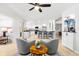 Open-concept layout connecting the kitchen and living room, creating a great space for entertaining at 8848 Sunlit Cove Ne Dr, St Petersburg, FL 33702
