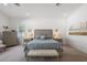 Clean, bright main bedroom with king bed, carpet, and ample natural light at 911 S Sterling Ave, Tampa, FL 33629
