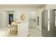 Open-concept kitchen showcasing a large island with seating and stainless steel appliances at 9406 Gladsome Dr, Land O Lakes, FL 34637