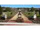 Magnolia Park featuring a decorative statue and gazebo, offering a charming and serene outdoor space at 9406 Gladsome Dr, Land O Lakes, FL 34637