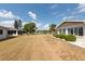Spacious backyard overlooking a serene lake, perfect for outdoor relaxation and entertaining at 106 Silverbell Ct, Sun City Center, FL 33573