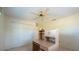 Bedroom with a ceiling fan and a closet at 106 Silverbell Ct, Sun City Center, FL 33573