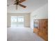 Bright living room offering sliding glass doors to a screened-in patio at 106 Silverbell Ct, Sun City Center, FL 33573