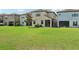 Spacious backyard with lush green grass at 1119 Ballard Green Pl, Brandon, FL 33511