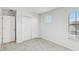Bright bedroom featuring neutral paint and a window allowing natural light at 1119 Ballard Green Pl, Brandon, FL 33511