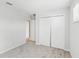Bedroom featuring neutral walls, plush carpet, a window and a large closet at 1119 Ballard Green Pl, Brandon, FL 33511