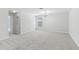 Neutral bedroom featuring plush carpet, light walls and a modern ceiling light at 1119 Ballard Green Pl, Brandon, FL 33511