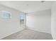 Bright bedroom featuring neutral paint and two windows allowing natural light at 1119 Ballard Green Pl, Brandon, FL 33511