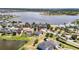 Aerial view of property showcasing backyard patio and large lake at 11322 Lake Lucaya Dr, Riverview, FL 33579