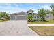 Charming single-Gathering home with a manicured lawn and a welcoming two-car garage at 11322 Lake Lucaya Dr, Riverview, FL 33579