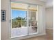 Relaxing balcony with seating overlooking lush palm trees and beautiful ocean views at 1200 Gulf Blvd # 404, Clearwater Beach, FL 33767