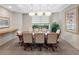Spacious conference room with large table, seating for eight, and natural light; perfect for meetings at 1200 Gulf Blvd # 404, Clearwater Beach, FL 33767