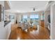 Bright living room with wood floors, comfortable seating, and stunning ocean views at 1200 Gulf Blvd # 404, Clearwater Beach, FL 33767