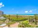Breathtaking ocean view from the property overlooking the beach and landscaped grounds at 1200 Gulf Blvd # 404, Clearwater Beach, FL 33767